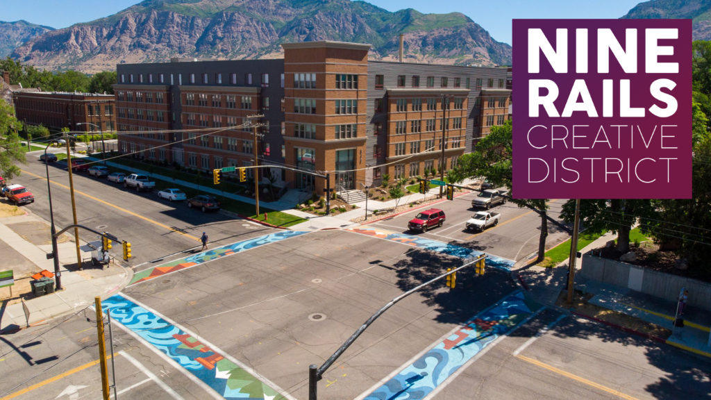 An aerial image of the Nine Rails Creative District in Ogden, Utah. The image shows the painted street project.